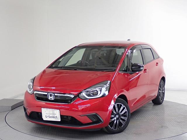 フィット(ホンダ) ｅ：ＨＥＶホーム２０周年特別仕様車カーサ　ホンダセンシング・ナビ・フルセグ・バックカメラ・前後ドラレコ・ＥＴＣ・サイドカーテンエアーバッグ・オートクルーズ・シートヒーター・ＬＥＤ・１６ＡＷ 中古車画像