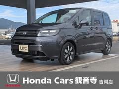 フリード e:HEVエアー EX 6人 新車未登録車 両側パワースライドドア アダプティブクルーズコントロール ホンダセンシング マルチビューカメラシステム ブラインドスポットインフォメーション 2列目キャプテンシート シートヒーター 中古車画像