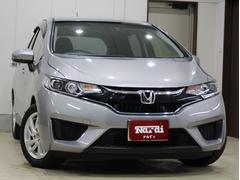 フィットハイブリッド Lパッケージ 純正HDDナビ・バックカメラ・ETC・クルーズコントロール・ハーフレザーシート・本革巻きステアリング・ステアリングリモコン・LEDライト・AUTOライト・衝突軽減システム・電動格納ミラー 中古車画像