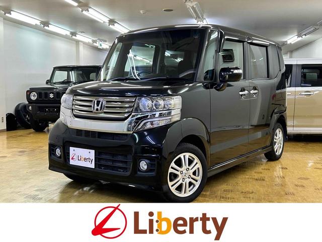 Ｎ−ＢＯＸカスタム(ホンダ) Ｇ・Ｌパッケージ　ＥＴＣ　バックカメラ　両側スライド・片側電動　ＴＶ　オートライト　ＨＩＤ　スマートキー　アイドリングストップ　電動格納ミラー　ベンチシート　ＣＶＴ　盗難防止システム　ＡＢＳ　ＥＳＣ　ＣＤ　ＤＶＤ再生 中古車画像