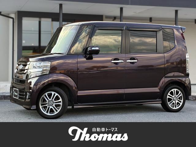 Ｎ−ＢＯＸカスタム(ホンダ) Ｇ・Ｌパッケージ　禁煙車　全国保証１２ヶ月走行無制限保証付き　電動スライドドア　ＨＩＤヘッドランプ　フォグランプ　ＳＤナビ　バックカメラ　ＥＴＣ　ドラレコ　ＢＴ　ＴＶ　ＤＶＤ　ＣＤ　オートリトラミラー　ステリモ 中古車画像