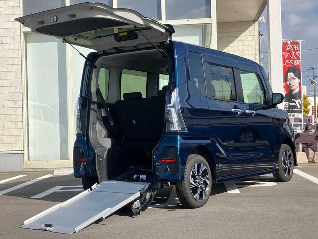 タント(ダイハツ) スローパーカスタムＲＳ　ワンオーナー／福祉車両　スローパー／電動ウィンチ／ターボ／ハーフレザーシート／メーカー１０インチナビ／フルセグＴＶ／ＢＴオーディオ／バックカメラ／ＥＴＣ２．０／前ドラレコ／ＬＥＤヘッドライト 中古車画像