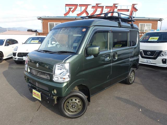 エブリイ(スズキ) ＰＣリミテッド　セーフティサポート装着車　ｐｌｕｓｌｉｎｅバンパー＆マフラー　リフトアップ　１２ＡＷ　ＧＩ★ＧＥＡＲルーフキャリア　ＨＤＤナビ　ワンセグＴＶ　ＥＴＣ　Ｂｒｏｓ．Ｃｌａｚｚｉｏ革調シートカバー 中古車画像