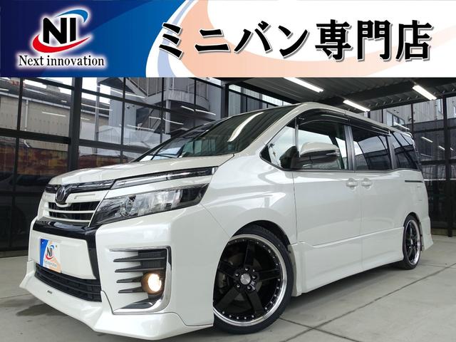 ヴォクシー ＺＳ　新品車高調・新品１９ＡＷ・新品タイヤ・シートカバー・ＴＲＤエアロ・ＴＲＤグリル・パワースライド・ＡＬＰＩＮＥ１０インチナビ・Ｂｌｕｅｔｏｏｔｈ・フルセグＴＶ・ＣＤ／ＤＶＤ・Ｂカメラ・ＥＴＣ・Ｗエアコン（1枚目）