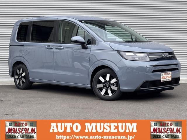 フリード(ホンダ) ｅ：ＨＥＶエアー　ＥＸ　登録済未使用車　１１．４型ナビ　フルセグテレビ　パノラミックビューモニター　ＥＴＣ２．０　前後ドラレコ　フロアマット（プレミアムタイプ）　アダプティブドライビングビーム　シートバックテーブル 中古車画像