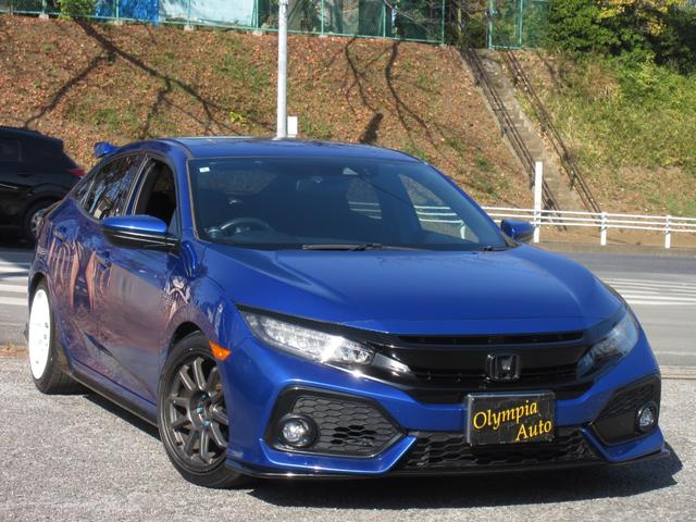 シビック(ホンダ) ハッチバック　ホンダセンシング　純正ＳＤナビ　ブルートゥースオーディオ　地デジフルセグＴＶ　バックカメラ　ＥＴＣ　前後ドラレコ　ＬＥＤヘッドライト　Aftermarketサス　Aftermarketマフラー　Aftermarket１７インチＡＷ　Aftermarketエアクリ　ワンオーナー　６速ＭＴ 中古車画像