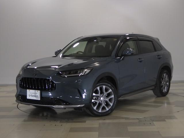 ZR−V(ホンダ) e:HEVX 禁煙・HondaCONNECTディスプレー・マルチビュー・3カメラドラレコ・ETC2.0・ワイヤレス充電・パーキングセンサー・後退出庫サポート・パワーテールゲート・ブラックエンブレム・ロアガーニッシュ 中古車画像