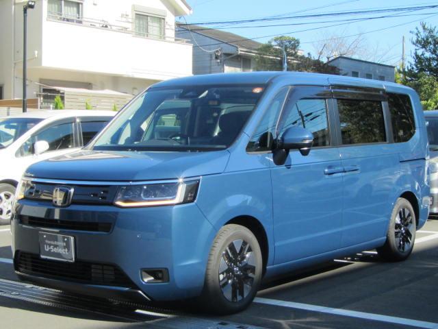 ステップワゴン(ホンダ) ｅ：ＨＥＶエアーＥＸ　当社試乗車・大型リア席モニターマルチビューカメラ・ＢＳＩ・パワーテールゲート・シートヒーター・ドラレコ前後・ＬＥＤ・ＥＴＣ・スマートキー・１６ＡＷ　ＵＳＢ　前席シートヒーター　フルセグＴＶ　ＤＶＤ 中古車画像