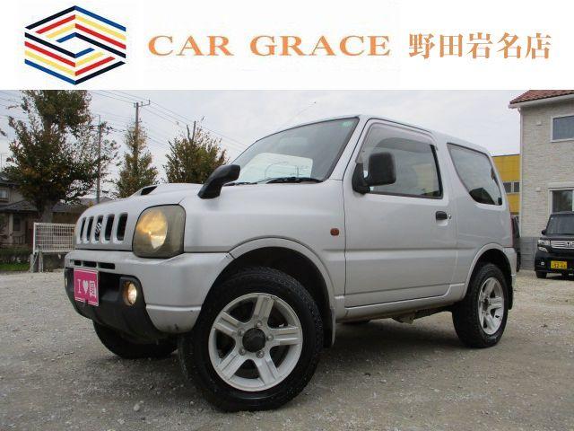 ジムニー(スズキ) XA 車検令和8年10月 5速マニュアル パートタイム4WD フォグランプ 純正アルミホイール 背面タイヤ ボンネットミラー ドアバイザー Wエアバック ABS 修復歴なし カセットラジオオーディオ 中古車画像