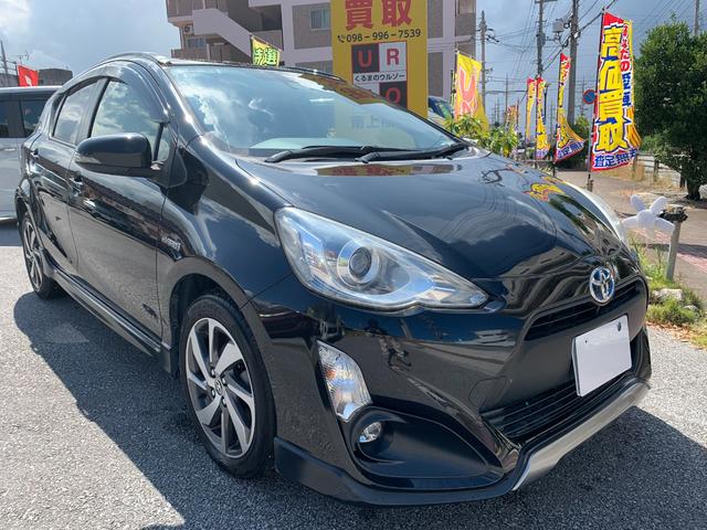 沖縄県の中古車ならアクア Ｘ－アーバン　ソリッド　社外ナビ・フルセグＴＶ・バックモニター・Ｂｌｕｅｔｏｏｔｈ・ビルトインＥＴＣ・ウィンカーミラー・フォグランプ・純正アルミホイール・プッシュ式スタート
