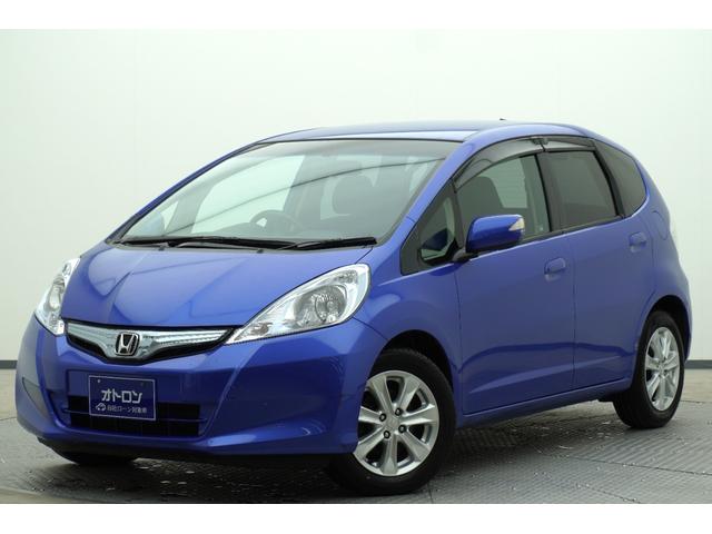 フィットハイブリッド(ホンダ) ナビプレミアムセレクション ハイブリッド ETC バックカメラ ナビ TV オートクルーズコントロール HID スマートキー アイドリングストップ 電動格納ミラー シートヒーター CVT 盗難防止システム 衝突安全ボディ 中古車画像
