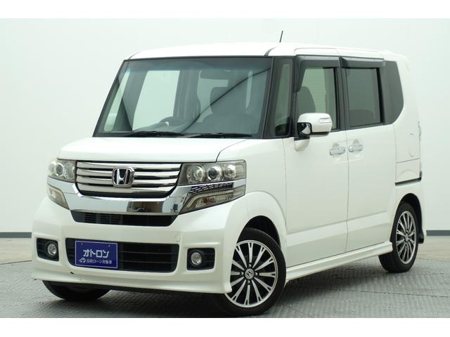 N−BOXカスタム(ホンダ) G・ターボパッケージ 両側電動スライドドア ナビ TV オートクルーズコントロール オートライト HID スマートキー 電動格納ミラー ベンチシート CVT 盗難防止システム ABS ESC CD USB アルミホイール 中古車画像