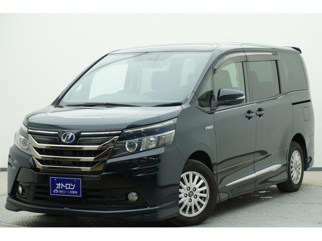 ヴォクシー(トヨタ) ハイブリッドＶ　ＥＴＣ　バックカメラ　ＴＶ　オートクルーズコントロール　両側電動スライドドア　ＬＥＤヘッドランプ　スマートキー　シートヒーター　３列シート　ＣＶＴ　アルミホイール　ＣＤ　ＵＳＢ　Ｂｌｕｅｔｏｏｔｈ 中古車画像