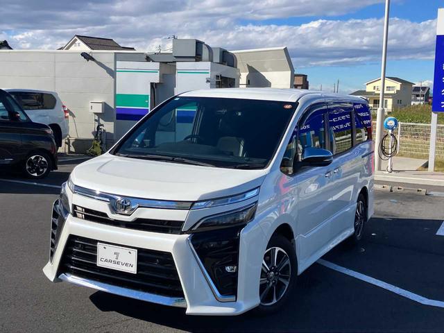 ヴォクシー(トヨタ) ＺＳ　煌ＩＩＩ　ワンオーナー　禁煙車　衝突軽減装置　ソナー　Aftermarketナビ　バックカメラ　ドライブレコーダー　ＥＴＣ　純正アルミホイール　純正ＬＥＤライト　Aftermarketアルミスタッドレス付　両側電動スライドドア 中古車画像