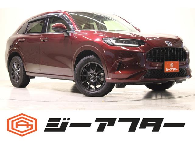 ＺＲ－Ｖ ｅ：ＨＥＶ　Ｚ　ワンオーナー／禁煙車／純正ナビ／全周囲カメラ／ステアリングヒーター／温熱黒革シート／ビルトインＥＴＣ２．０／電動リアゲート／置くだけ充電／レーダークルーズ／ＵＳＢポート／シートメモリー付きパワーシート（1枚目）
