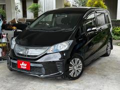 フリードハイブリッド ジャストセレクション 両側パワースライド スマートキー×2 TV ナビ バックカメラ HIDライト ウィンカーミラー 純正アルミ ETC 三列シート アイドリングストップ 横滑り防止 中古車画像