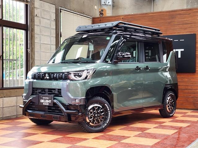 沖縄県中頭郡北谷町の中古車ならデリカミニ Ｔ　プレミアム　４ＷＤ　ターボ　両側パワースライド　デジタルルームミラー　マルチアラウンドモニター　オートフラッグスＦバンパーガード　ルーフラック　リアラダー　ＷＯＲＫ１５インチＡＷ　ＴＯＹＯオープンカントリー