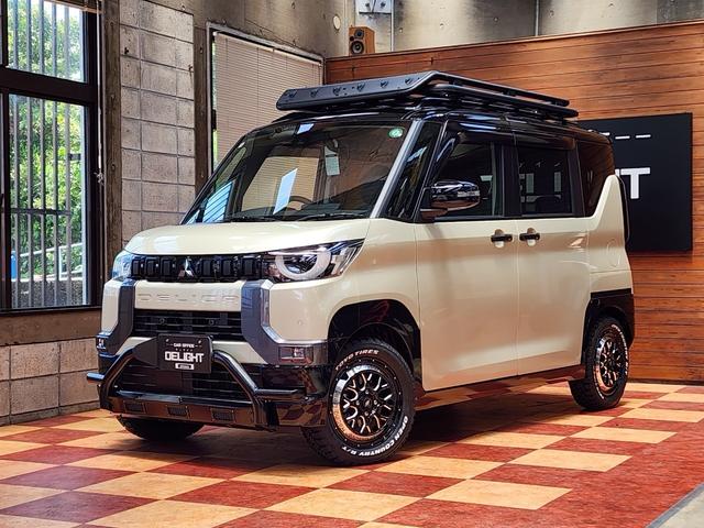 沖縄県の中古車ならデリカミニ Ｔ　プレミアム　４ＷＤ　ターボ　両側パワースライド　デジタルルームミラー　マルチアラウンドモニター　オートフラッグスＦバンパーガード　ルーフラック　リアラダー　ＷＯＲＫ１５インチＡＷ　ＴＯＹＯオープンカントリー