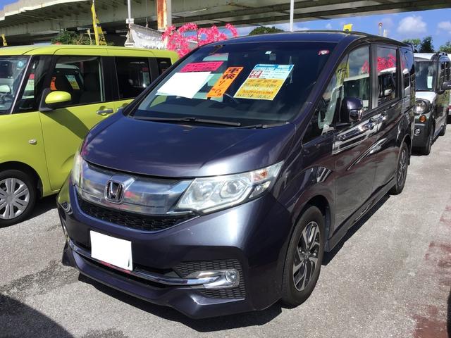 沖縄県の中古車ならステップワゴンスパーダ スパーダ　ホンダセンシング　純正９インチナビ／ＴＶ／ＤＶＤ／Ｂｌｕｅｔｏｏｔｈ　バックモニター　ＥＴＣ　両側パワースライドドア　純正アルミホイール