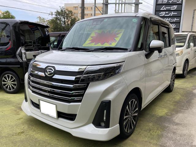 沖縄県の中古車ならトール カスタムＧ　ターボ　９インチメモリーナビ　ドラレコ　バックカメラ　アラウンドビューモニター　社外レザーカバー　ＥＴＣ　ステアリングスイッチ　両側パワスラ　全車速追従機能付ＡＣＣ　電動パーキングブレーキ　純正アルミ