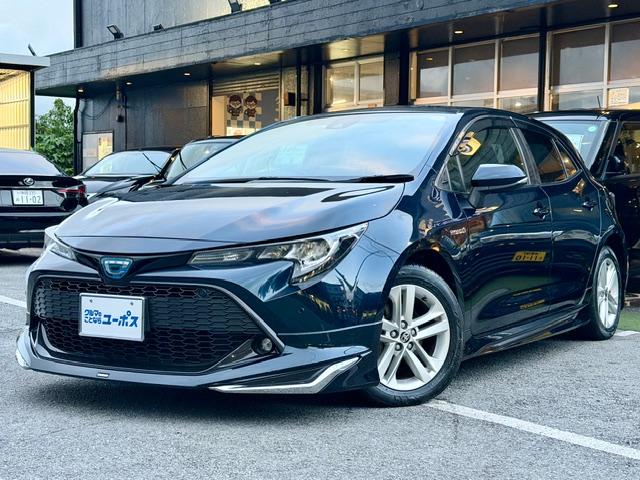 カローラスポーツ(トヨタ) ハイブリッドG OP10年保証対象車 純正9インチナビ モデリスタフルエアロ LEDヘッドライト 両席シートヒーター 電動パーキング ブレーキホールド クルーズコントロール 前後コーナーセンサー 革巻きステアリング 中古車画像