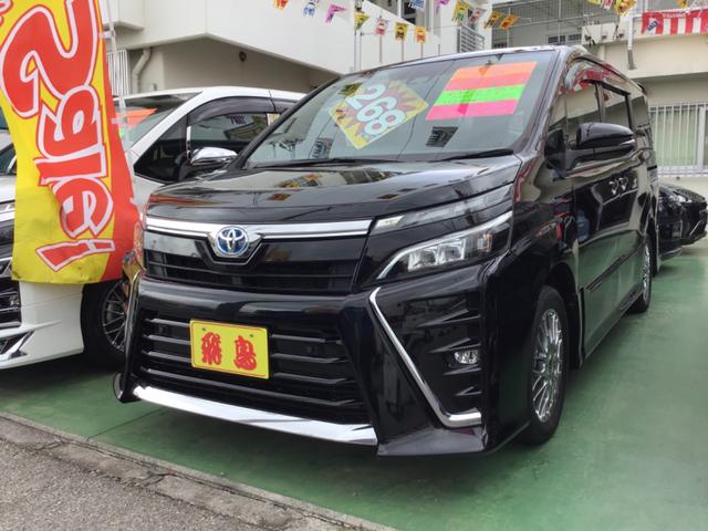 沖縄県の中古車ならヴォクシー ハイブリッドＺＳ　トヨタセーフティセンス　トヨタ純正ワイドナビ　フルセグ　Ｂｌｕｅｔｏｏｔｈ　ＤＶＤ　バックモニター　トヨタ純正フリップダウン　前後ドライブレコーダー両側パワースライドドア　レザーシートコーナーセンサー