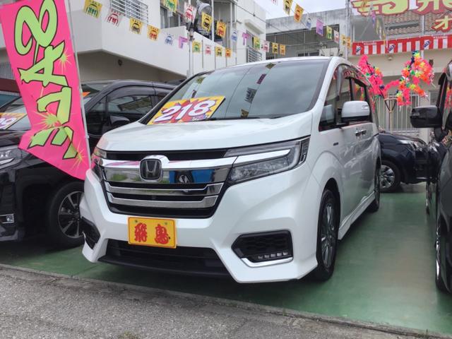 沖縄県の中古車ならステップワゴンスパーダ スパーダハイブリッド　Ｇ・ＥＸ　ホンダセンシング　ホンダセンシング　ホンダ純正ワイドナビ　フルセグ　Ｂｌｕｅｔｏｏｔｈ　ＤＶＤ　全方位モニター　ヘッドライト　ＬＥＤ　フォグランプ　ＬＥＤ　ハーフレザーシート　両側パワースライドドア