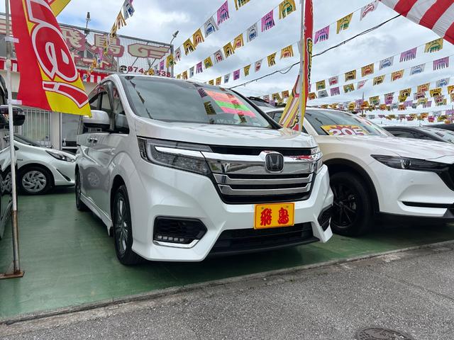 沖縄県の中古車ならステップワゴンスパーダ ｅ：ＨＥＶスパーダ　Ｇ・ＥＸ　ホンダセンシング　ホンダセンシング　ホンダ純正ワイドナビ　フルセグ　Ｂｌｕｅｔｏｏｔｈ　ＤＶＤ　バックモニター　アップルカーペイ　ホンダ純正フリップダウン　両側パワースライドドア前後ドライブレコーダーハーフレザーシート