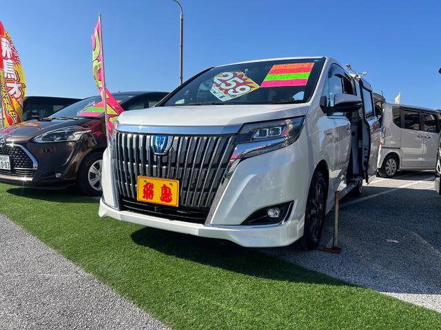 エスクァイア(トヨタ) ハイブリッドＧｉ　トヨタ純正ワイド１０．５インチナビ　トヨタ純正フリップダウン　両側パワースライドドア　前後ドライブレコーダー　コーナーセンサー　１００Ｖ電源　フロントモニター　バックモニター　　ＨＤＭＩ 中古車画像