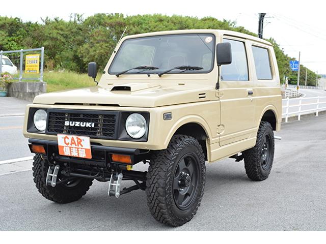ジムニー(スズキ) ワイルドウインドリミテッド JA11V改・リフトアップ車・MT車・ベージュ色替え・新品ヨコハマジオランダMTタイヤ・新品ヴィンテージシートカバー・新品ウッドハンドル交換・天張り張り替え・新品フロントグリル・本土中古車 中古車画像