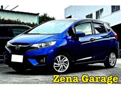 フィットハイブリッド Sパッケージ 2年保証付き 本土仕入 タイヤ4本新品交換 4WD車 ハイブリッド 車両接近通知装置 衝突軽減ブレーキ クルーズコントロール パドルシフト 革巻きステアリング プッシュスタート 純正アルミホイール 中古車画像