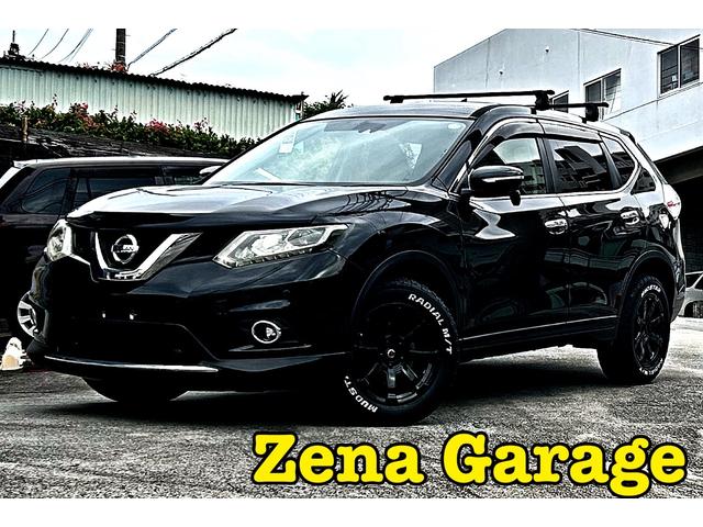 エクストレイル(日産) ２０Ｘ　エマージェンシーブレーキパッケージ　２年保証付き　本土仕入　Ｍ／Ｔタイヤ　Aftermarket１７インチアルミホイール　プッシュスタート　衝突軽減ブレーキ　ルーフキャリア付き　革巻きステアリング　シートヒーター　アイドリングストップ　横滑り防止機能 中古車画像