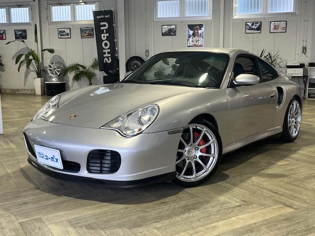 那覇市 ユーポス　那覇新都心店 ポルシェ ９１１ ９１１ターボ　４ＷＤターボ車　レザーシート（黒）　ＡＤＶＡＮ　Ｒａｃｉｎｇ１９インチアルミホイール　ティプトロ　ＨＩＤヘッドライト　ＥＴＣ車載器 シルバー 3.4万km 2001(平成13)年