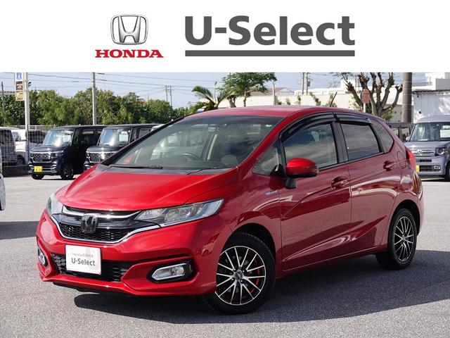 沖縄県浦添市の中古車ならフィットハイブリッド Ｌホンダセンシング　社外オーディオ　スマートキー、リアカメラ、オーディオＣＤ、ドアバイザー　防錆済　Ｒカメ　ＬＥＤ　サイドＳＲＳ　横滑り防止　ドライブレコーダー　パワーステアリング　オートクルーズ　ＥＴＣ車載器　ＡＢＳ