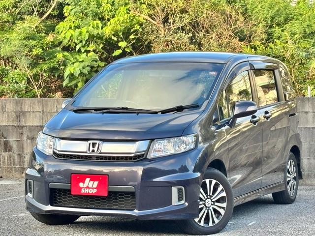 沖縄県の中古車ならフリードスパイク Ｇ　エアロ　ナビ　ＴＶ　バックカメラ　ＥＴＣ　両側パワースライドドア　Ｂｌｕｅｔｏｏｔｈ対応　純正アルミ１５インチ　ＨＩＤ