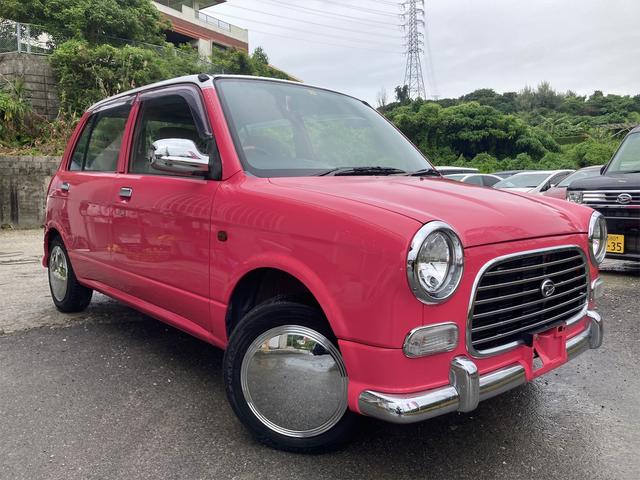 沖縄県の中古車ならミラジーノ ジーノ　内地仕入車両　ＦＭトランスミッターＢｌｕｅｔｏｏｔｈ　ピンクツートンカラー　ＣＤ　ヘッドライトコーティング