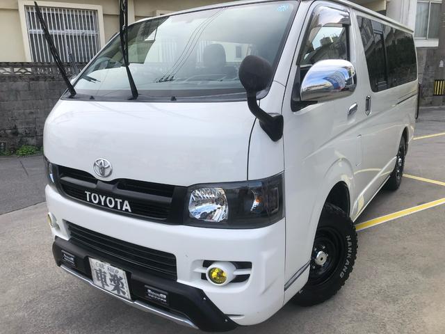 沖縄県の中古車ならハイエースバン ロングスーパーＧＬ　新品バッテリー／１年保証／ＭＴタイヤ／インナーブラックヘッドライト／インテリアパネル／レザーシートカバー／ベットキット／オフロードフェイス