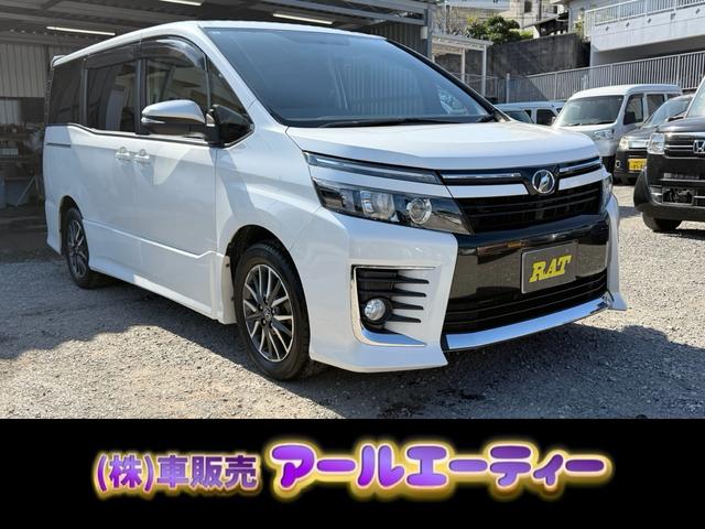 ヴォクシー(トヨタ) ＺＳ　本土車両　ナビ　フルセグ　ＤＶＤ　Ｂｌｕｅｔｏｏｔｈ接続　ステアリングスイッチ　両側パワースライドドア　ＥＴＣ　　アイドリングストップスイッチ　エコモードスイッチ　レーンアシスト 中古車画像