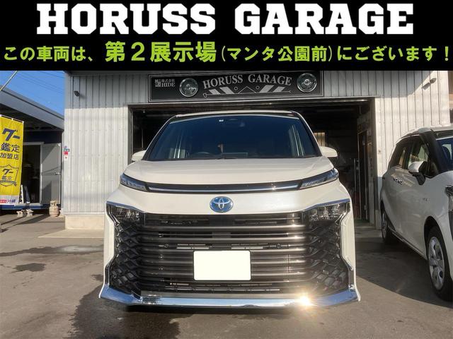 沖縄市 ＨＯＲＵＳＳ　ＧＡＲＡＧＥ（ホルスガレージ） トヨタ ヴォクシー ハイブリッドＳ－Ｚ　ナビ　アルミ　バックモニター　７人乗り パールホワイト 1.8万km 2022(令和4)年