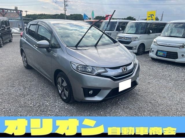フィットハイブリッド(ホンダ) Lパッケージ 一年保証 プッシュスタート スマートキー ナビ フルセグTV Bluetooth接続 ETC ハーフレザーシート エンジンオイル・バッテリー・ワイパーゴム新品 中古車画像