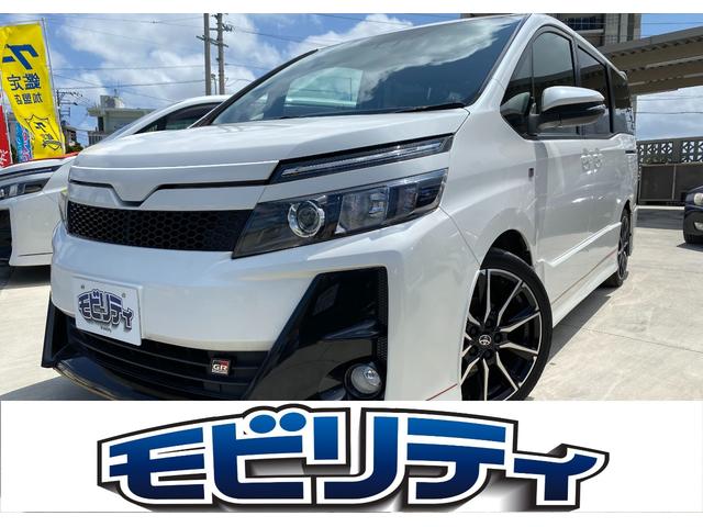 沖縄県の中古車ならヴォクシー ＺＳ　ＧＲスポーツ　純正９インチナビ　純正１２インチフリップダウンモニター　衝突軽減ブレーキ　バックカメラ　ＴＶ　ＤＶＤ　Ｂｌｕｅｔｏｏｔｈ　ＥＴＣ　ハーフレザーシート　ＬＥＤヘッドライト