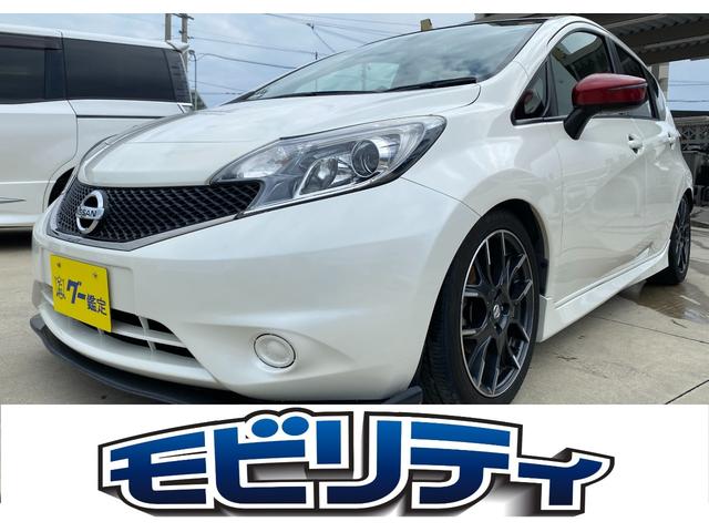 沖縄県の中古車ならノート ニスモ　Ｓ　５ＭＴ　ＨＫＳマフラー　ＢＬＩＴＺ車高調　県外仕入れ　ＥＴＣ　バックカメラ　ナビ　ＴＶ　アルミホイール　ＬＥＤヘッドランプ　スマートキー　盗難防止システム　衝突安全ボディ　ＣＤ　ＤＶＤ再生　ＵＳＢ