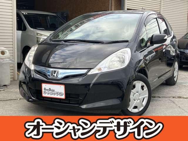 沖縄県豊見城市の中古車ならフィットハイブリッド ベースグレード　キーレスエントリー　盗難防止システム　衝突安全ボディ　ＡＢＳ　運転席エアバッグ　助手席エアバッグ　ワンセグ　ＣＤ　ＤＶＤ