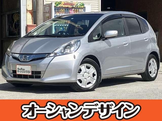 沖縄県の中古車ならフィットハイブリッド スマートセレクション　ＨＤＤナビ　バックカメラ　キーレスエントリー　シガーソケット　運転席エアバッグ　助手席エアバッグ　ＡＢＳ　盗難防止システム　衝突安全ボディ　自社　ローン対応