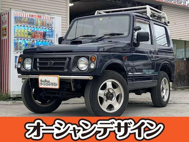 豊見城市 オーシャンデザイン　沖縄店　株式会社　ＡＯＺＯＲＡ　ＣＯＭＰＡＮＹ スズキ ジムニー ワイルドウインド　４ＷＤ　５ＭＴ　ＥＴＣ　ドラレコ　キャリア付　社外マフラー　ＲＡＺＯアルミペダル　ターボ車　自社ローン対応 スキューバブルーメタリック 16.8万km 1996(平成8)年