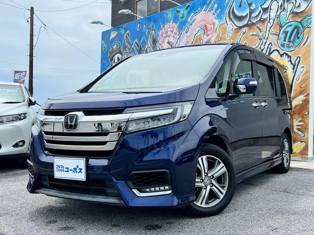 沖縄県の中古車ならステップワゴンスパーダ スパーダハイブリッド　Ｇ　ホンダセンシング　ＯＰ１０年保証対象車　純正メモリーナビ（ＣＤ／ＤＶＤ／Ｂｌｕｅｔｏｏｔｈ／フルセグ）バックモニター　わくわくゲート　オートクルーズコントロール　ブレーキホールド　ホンダセンシング　ＥＴＣ
