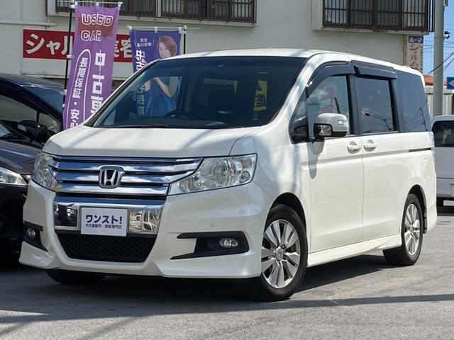 沖縄県糸満市の中古車ならステップワゴンスパーダ Ｚ　内地仕入／スマートキー／純正ＨＤＤナビ／ワンセグＴＶ／ＣＤ／ＤＶＤ／バックカメラ／ＥＴＣ／両側電動スライドドア／フリップダウンモニター／オートエアコン／純正アルミ／ＨＩＤヘッドライト／フォグランプ