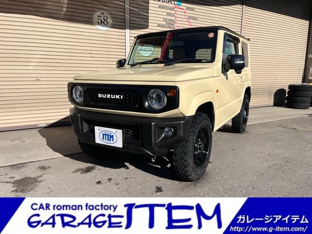 ジムニー(スズキ) XC 中古純正アルミスタッドレスセット付 エンジンスターター Aftermarketアルミホイール オフロードタイヤ オプショングリル 革調Aftermarketシートカバー 8インチナビ バックカメラ アクティブクルコン シートヒーター 中古車画像