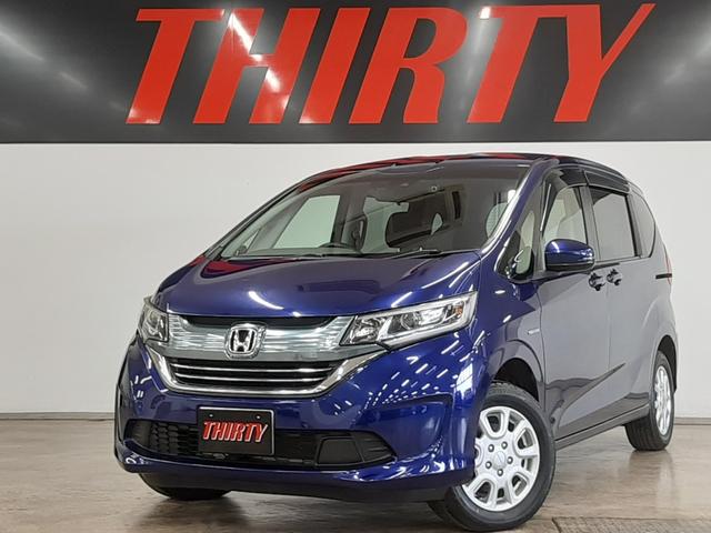 フリードハイブリッド(ホンダ) ハイブリッド・Ｇホンダセンシング　４ＷＤ　１オーナー　リモコンエンジンスターター　ナビ　フルセグＴＶ　レーダークルコン　両側電動スライド　シートヒーター　スマートキー　オートライト　ＬＥＤヘッドライト　レーンキープ　標識認識 中古車画像