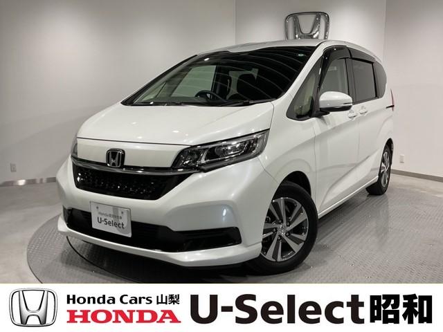 フリード(ホンダ) Ｇ・ホンダセンシング　メモリーナビ　リアカメラ　ＥＴＣ　両電動スライドドア　ブレーキサポート　エコアイドル　Ｂモニター　横滑り防止機能　セキュリティ　スマ−トキ−　ナビ＆ＴＶ　キーレス　クルーズＣ　ＬＥＤランプ　ＳＲＳ 中古車画像